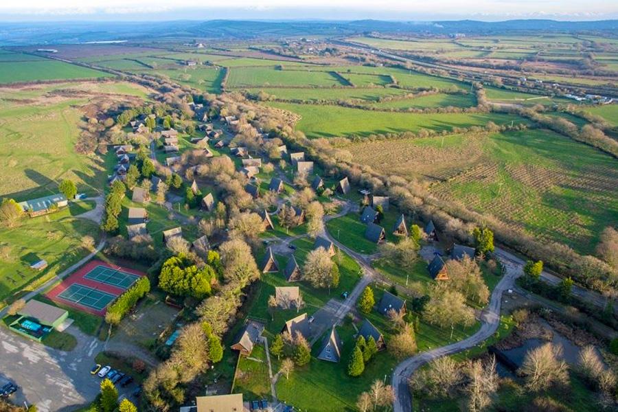 ariel overview of the loadges at Bodmin Holiday Park