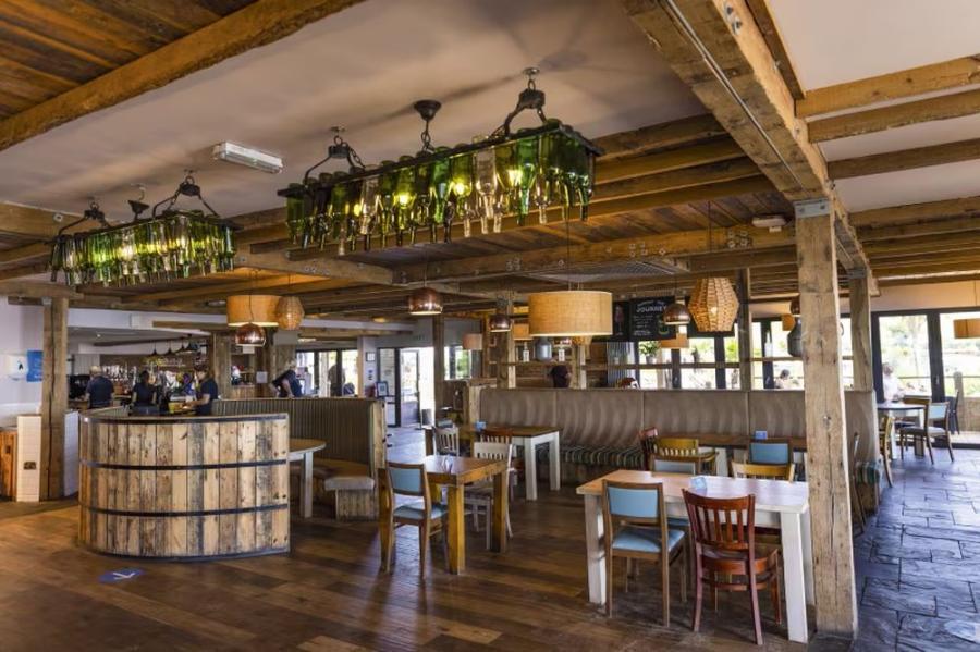 bar and seating area at Devon Cliffs Holiday Park