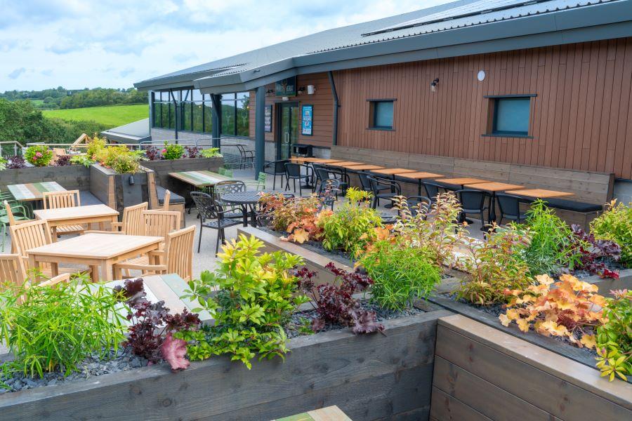 seating outside the entertainment venue at Hedley Wood Holiday Park