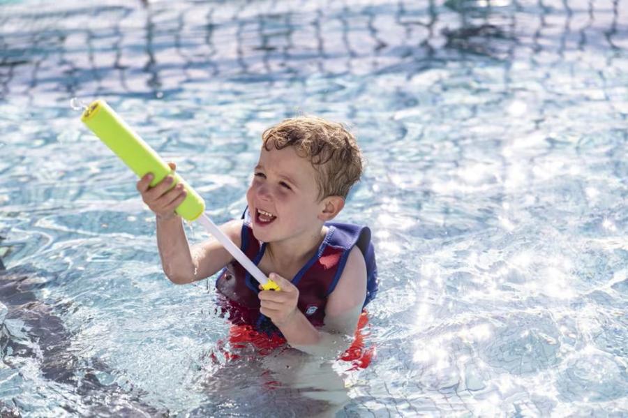 playing in the pool at Littlesea Holiday Park