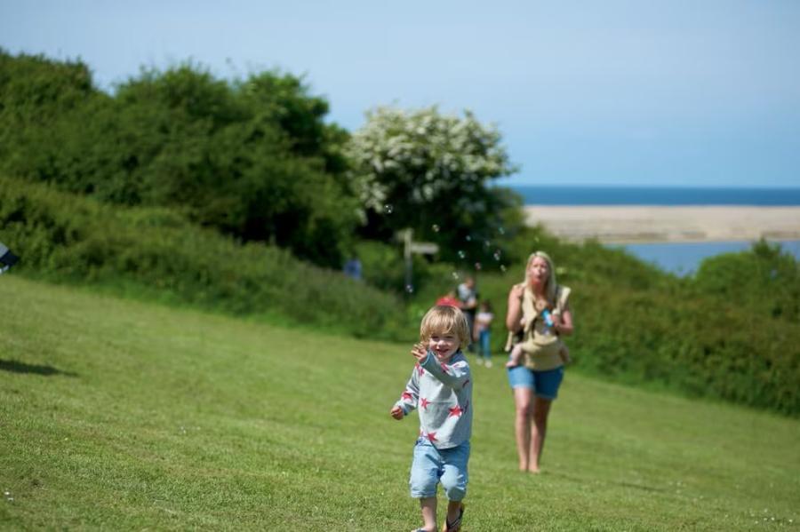 enjoyning a walk at Littlesea Holiday Park