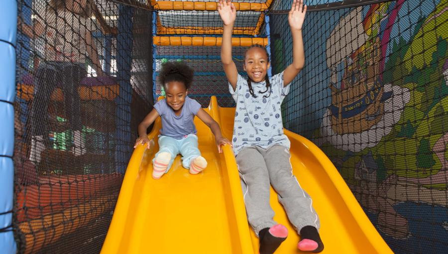 on the slides in the soft play area.