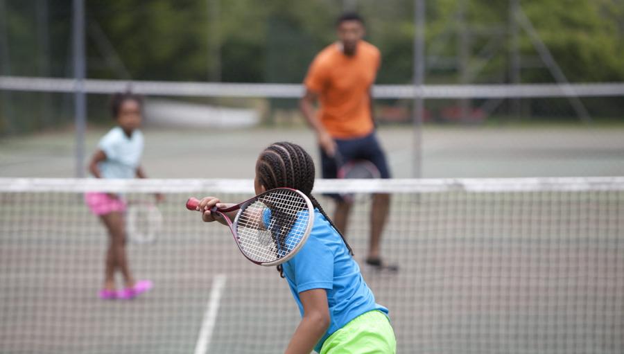 playing tennis on holiday