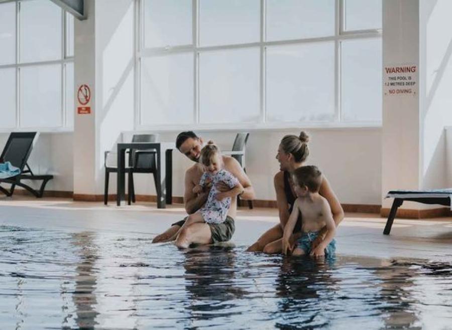 enjoying the indoor pool at Newperran Holiday Resort