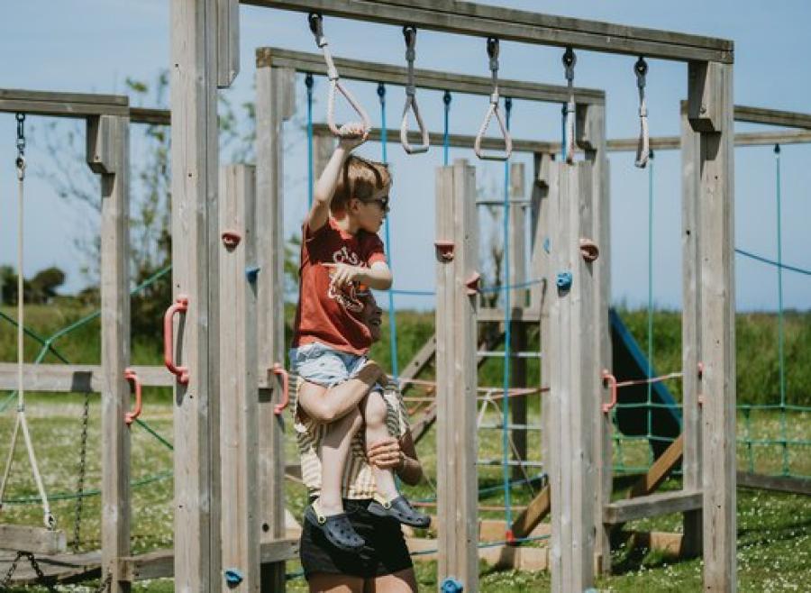 kids on the swings in the playground