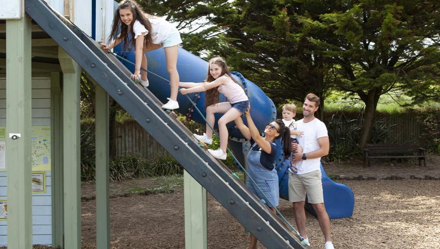 going up the slide at Ruda Holiday Park