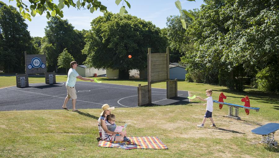 outdoor play area with seating at St Minver Holiday Park