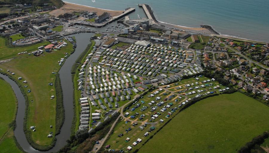 by the beach at West Bay Holiday Park