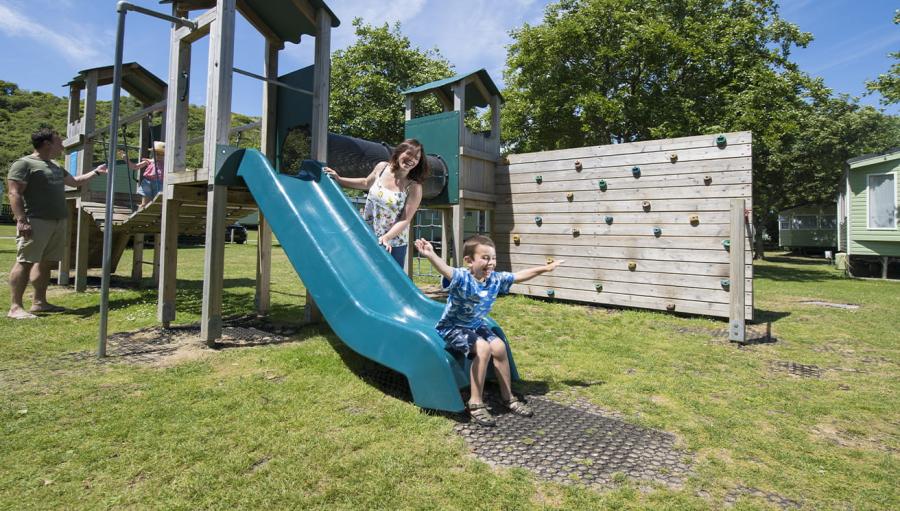 kids on the slide on the park