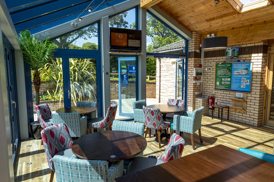 relaxing on the sofas at Wood Farm Holiday Park