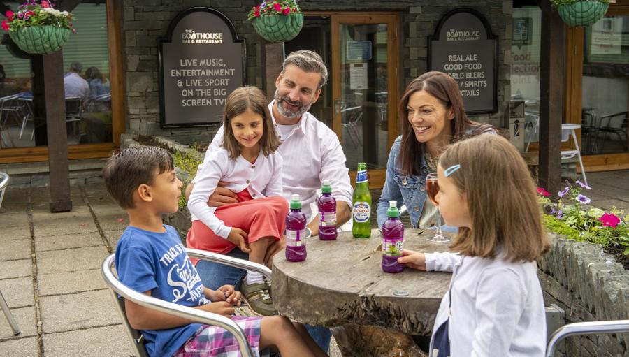 drinking outdoors at Fallbarrow Holiday Park