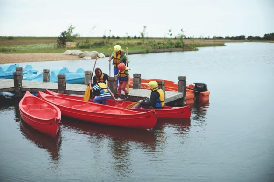 canoes on the lake at Lakeland Holiday Park