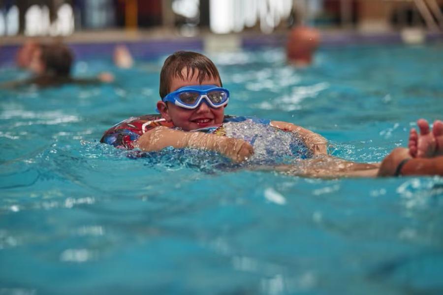 swimming in the pool on holiday