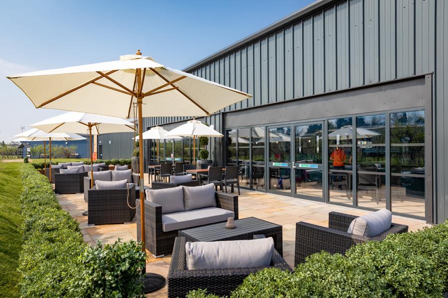 outdoor sun terrace at Broadland Sands Holiday Park