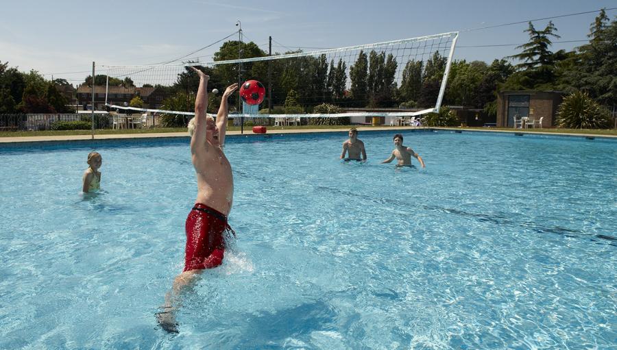 playing waterpolo in the outdoor pool at Valley Farm Holiday Park