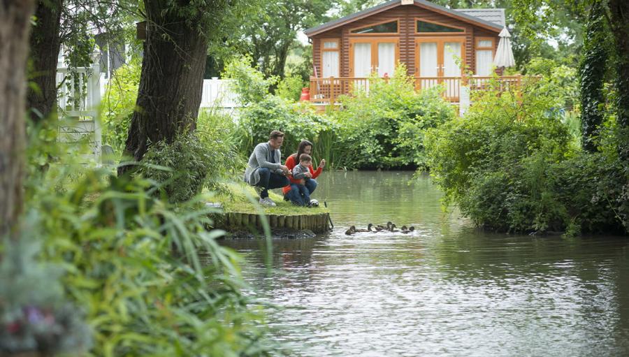 fishing lakes by lodges at Weeley Bridge Holiday Park