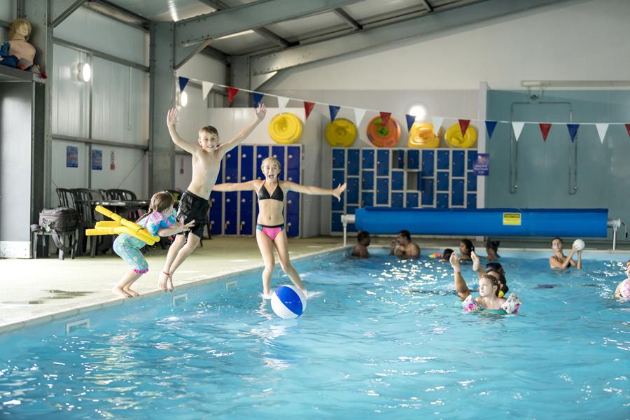 having fun  in the pool on holiday at Harts Holiday Park