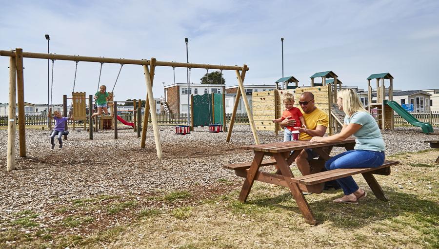 outdoor swings for the kids at Romney Sands Holiday Park