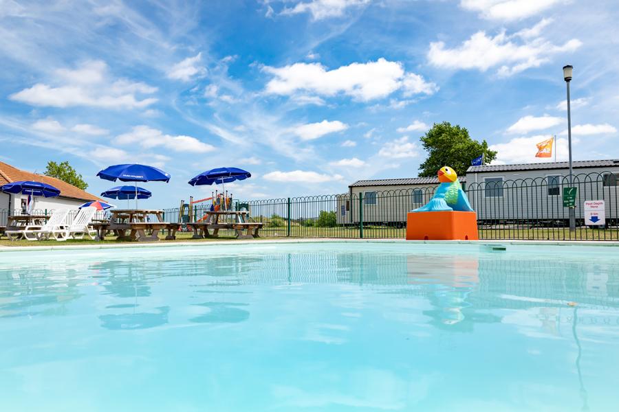 outdoor pool by caravans at Seaview Holiday Park