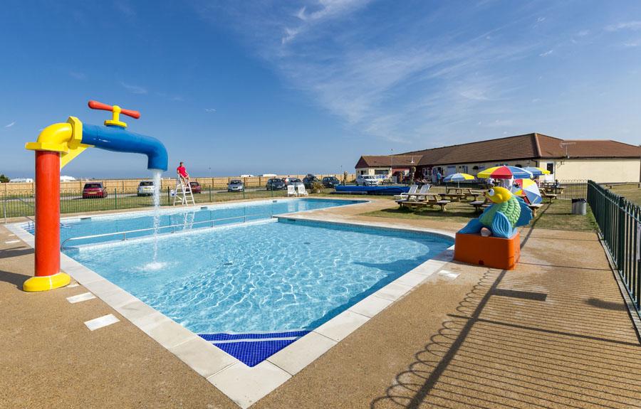 outdoor pool with kids splash pool in kent