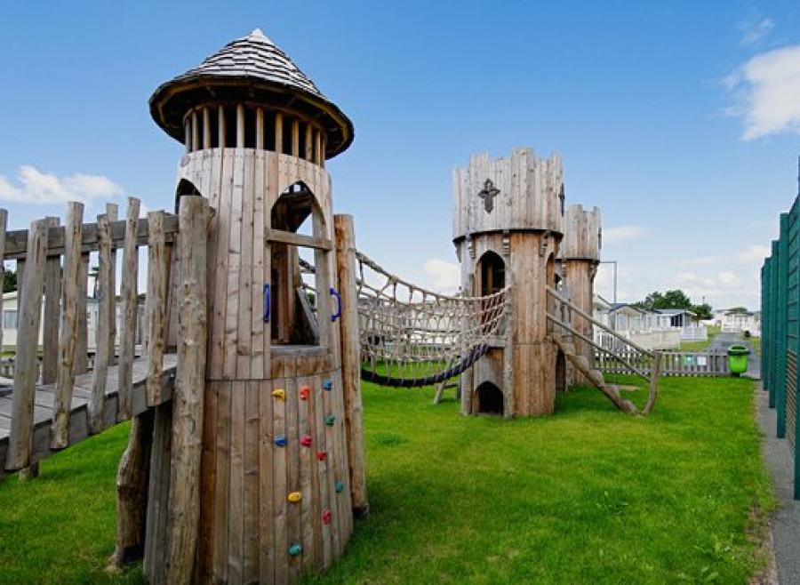 enjoy climbing on the adventure playground at Barmouth Bay Holiday Park