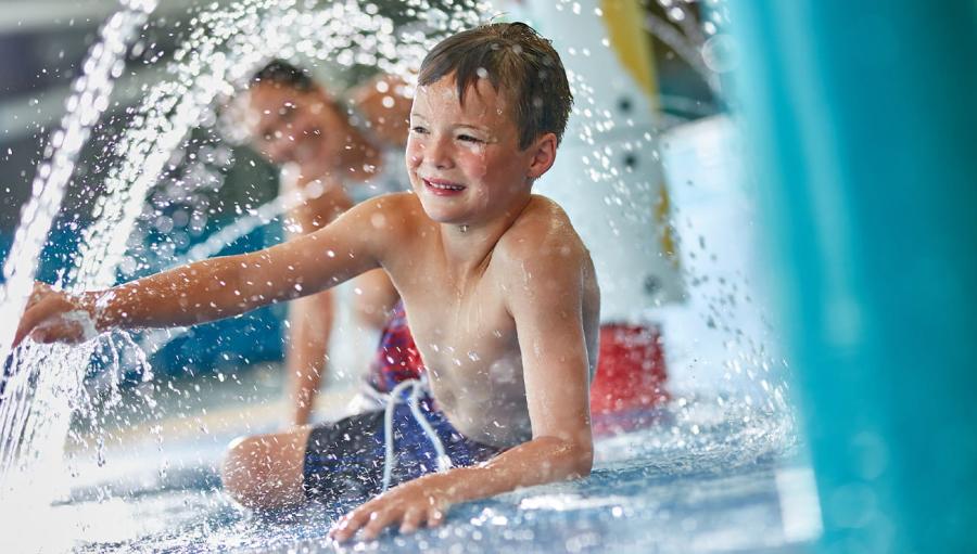 plyaing in the indoor pool at Carmarthen Bay Holiday Park