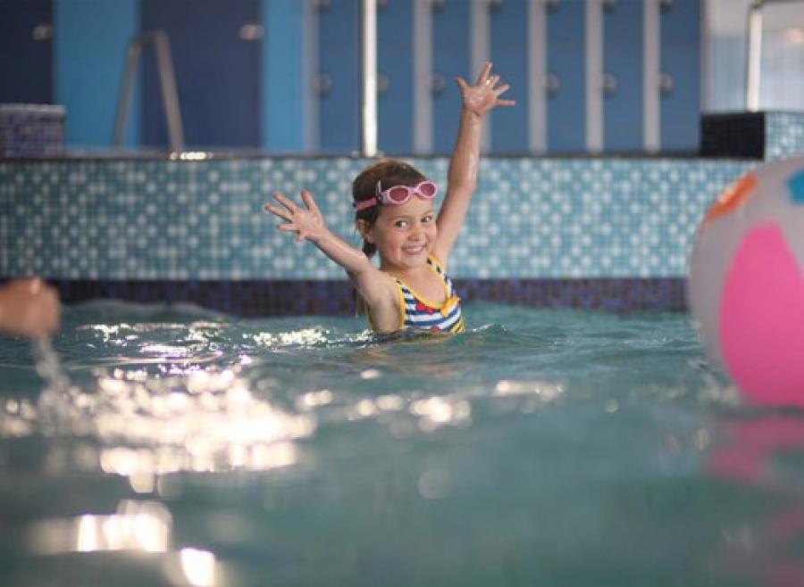 playgin in the pool in Rhyl at Golden Sands Holiday Park