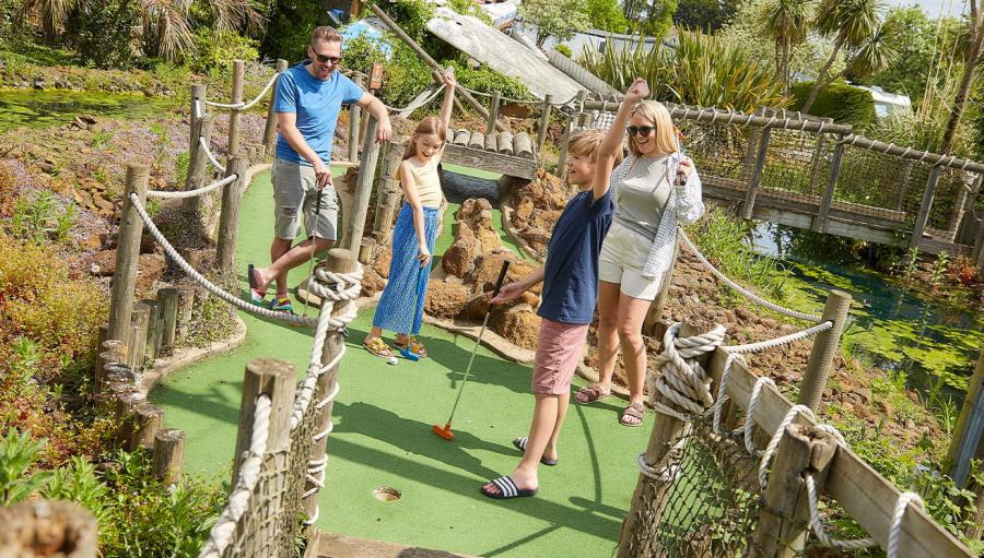 enjoying the crazy golf course at Vauxhall Holiday Park