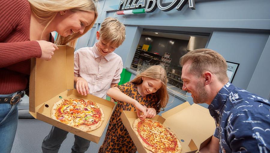 having some pizza on holiday at Vauxhall Holiday Park