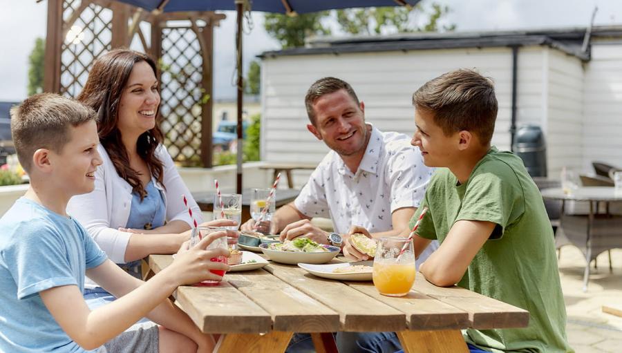 eating outside on holiday at Heacham Beach Holiday Park