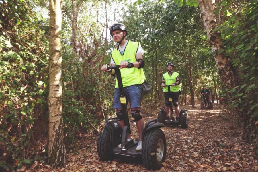 enjoying exploring the woods at Hopton Holiday Village