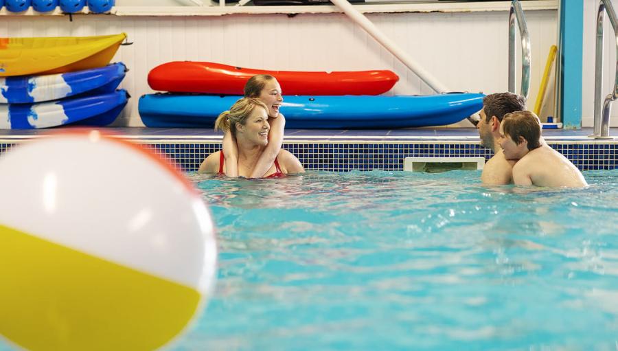 in the swimming pool at Sandy Bay Holiday Park