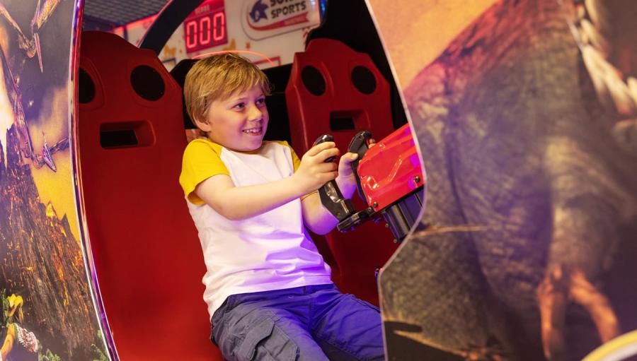 playing on the amusements at Sandy Bay Holiday Park