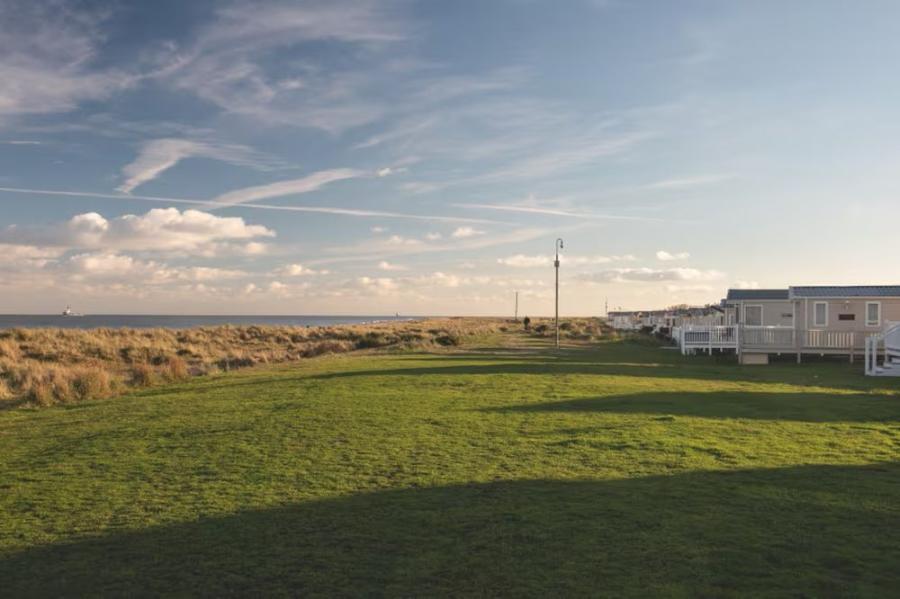 caravans by the beach in great Yarmouth at Seashore Holiday Park