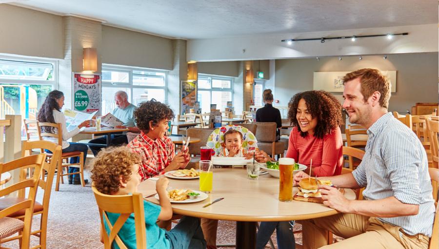 enjoying a meal on holiday at Summerfields Holiday Park