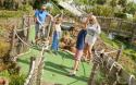 enjoying the crazy golf course at Vauxhall Holiday Park