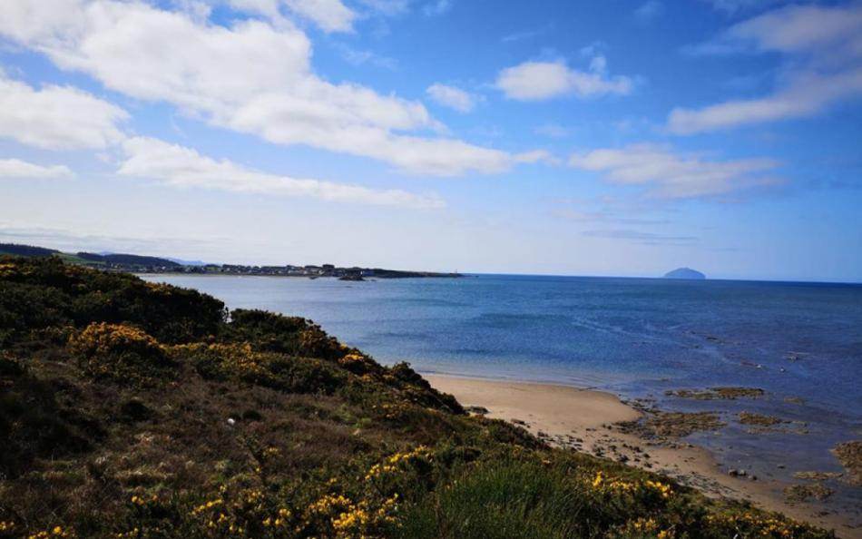 A view of a Scottish Beach looking out to Sea and Ailsa Craig